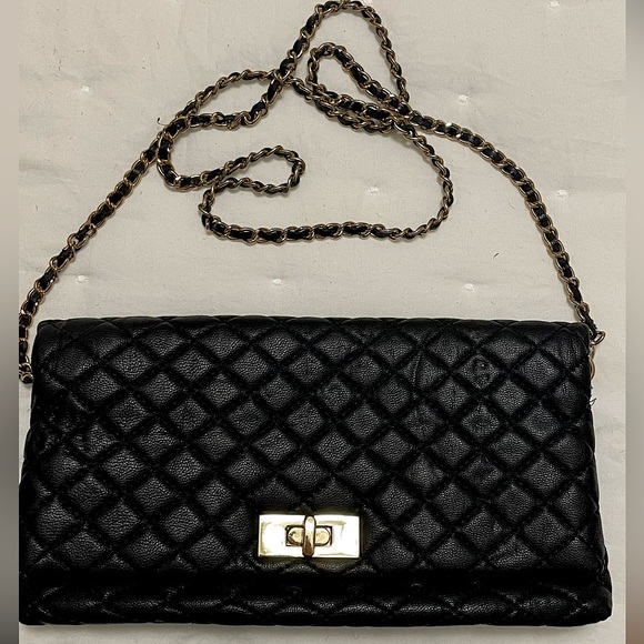 Forever 21 Handbags - Black quilted fold over clutch with gold hardware. Removable strap. Snap closure